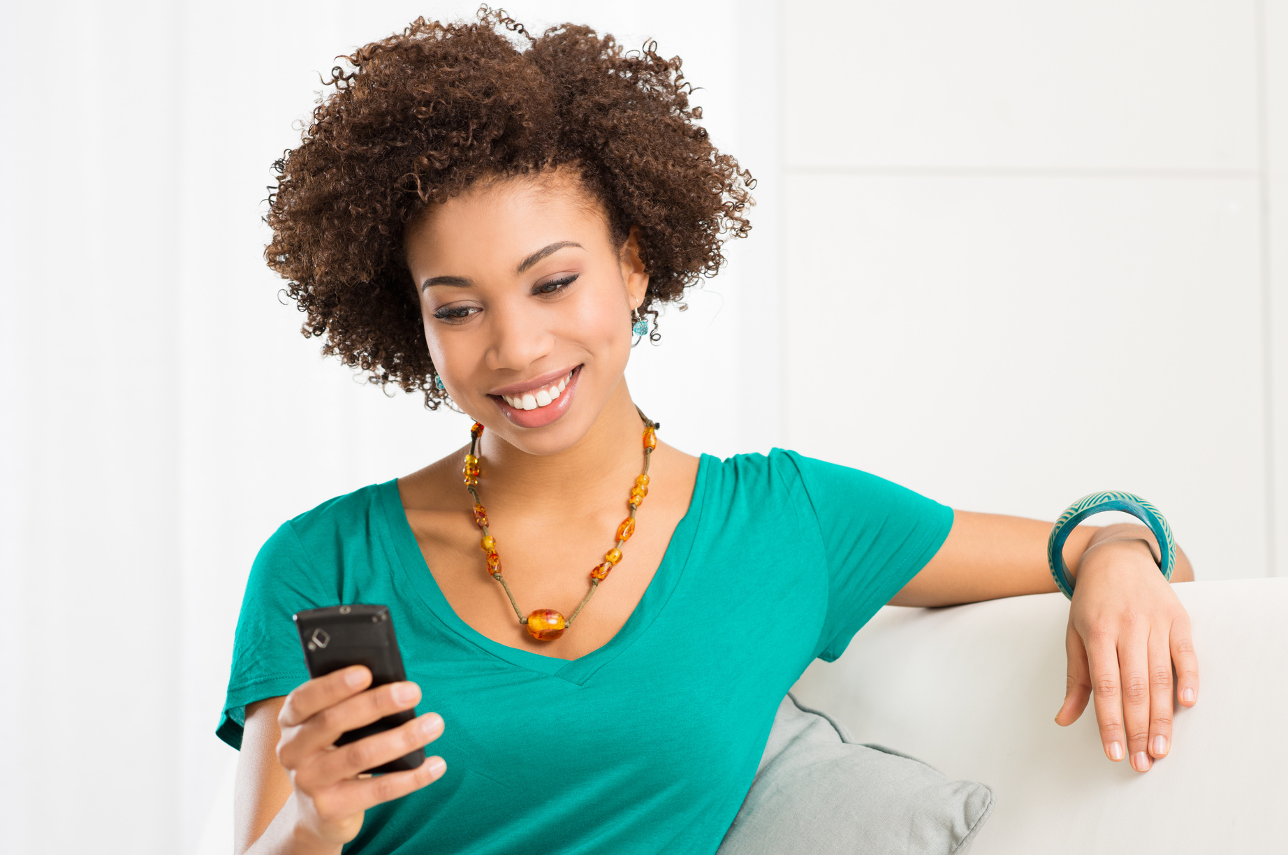 Young Woman Looking at Cellphone